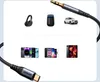 A collage of electronic devices and a car, with a USB-C to 3.5mm AUX cable prominently featured. Anteprima dell’immagine prodotto