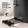 Close-up of a toaster's crumb tray being removed, with text highlighting its features. Produktbild-Vorschau