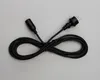 A black power cord with a European plug and a female connector is laid out in a figure-eight shape on a gray background. Produktbild-Vorschau