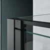 Close-up view of the corner of a black framed shower enclosure with clear glass panels. Produktbild-Vorschau