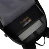 Interior view of a backpack, showing a laptop compartment and a label. Produktbild-Vorschau