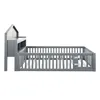 A side view of a gray wooden children's bed with a house-shaped headboard and a built-in shelf. Náhled obrázku produktu