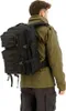 A person wearing a backpack. Produktbild-Vorschau