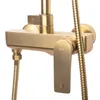 A close-up shot of a gold shower faucet. Anteprima dell’immagine prodotto