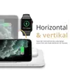 A white charging station with a smartphone and smartwatch charging on it, with text overlays describing features. Produktbild-Vorschau
