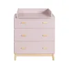 A pink changing table with wooden accents and legs, shown against a white background. Podgląd zdjęcia produktu