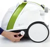 A hand is shown adjusting a dial on a white and green steam cleaner. Anteprima dell’immagine prodotto