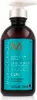 A brown pump bottle of Moroccanoil Intense Curl Cream against a white background. Produktbild-Vorschau