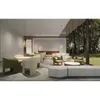 A modern lounge area with comfortable seating and large windows overlooking a garden. Produktbild-Vorschau