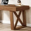 A close-up view of a wooden desk with a laptop and books on top. Anteprima dell’immagine prodotto