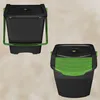 Two black and green compost bins are shown against a light beige background. One bin is shown from the front with its handle up, and the other is shown from the front-right at an angle. Produktbild-Vorschau