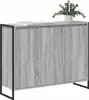 A gray wood-effect sideboard with black metal legs and frame, shown in a studio setting with a plant and some books on top. Podgląd zdjęcia produktu