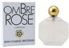 Achteckige Parfumflasche mit opak-weißer Reliefoberfläche und goldener Kugelkappe, daneben weiße Schachtel mit großem Ombre Rose Schriftzug in Schwarz. Podgląd zdjęcia produktu