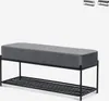 A dark gray upholstered bench with a black metal frame and a slatted shelf underneath, presented against a white background. Two smaller images of similar benches in different colors are visible in the top right corner. Produktbild-Vorschau