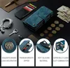 A flat lay of a blue wallet phone case with various accessories and coins. Produktbild-Vorschau