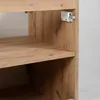 Close-up view of the side of a wooden cabinet, showing shelves and a metal latch mechanism. Anteprima dell’immagine prodotto