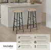 Two bar stools are shown in a modern kitchen setting next to a kitchen island. Náhled obrázku produktu