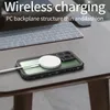 A smartphone case is shown on a desk with a wireless charger connected to it, next to a keyboard and mouse. Produktbild-Vorschau