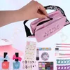 A hand is shown opening a pink makeup bag, surrounded by various makeup and nail cosmetic items for children. Produktbild-Vorschau