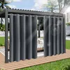 Outdoor curtains hanging from a pergola on a sunny day, with a patio and lawn visible. Produktbild-Vorschau
