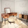 A vanity area with a wooden dressing table, stool, and cabinet. Produktbild-Vorschau