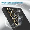 A close-up view of a smartphone's camera lens area, adorned with decorative gold rings and faux gemstones. Water splashes are depicted around the lenses, suggesting water resistance. Produktbild-Vorschau