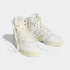 A pair of white Adidas Rivalry Hi high-top sneakers with cream laces and light gray accents, presented on a white background. Produktbild-Vorschau
