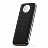 A black Satechi Quatro Wireless Power Bank with a white charging pad is shown against a white background. Produktbild-Vorschau