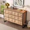 A modern sideboard with a wood-grain finish and black metal frame is placed in a room with a window and a rug. Anteprima dell’immagine prodotto