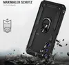 A black phone case with a ring holder is shown in a dynamic pose, appearing to be dropped onto a rocky surface. Debris is flying around the case, suggesting durability and protection. Produktbild-Vorschau
