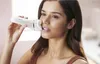 A woman is using a Philips epilator on her face. Anteprima dell’immagine prodotto