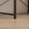 Close-up of the leg of a desk and the floor. Produktbild-Vorschau