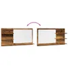 Two identical bathroom mirrors with shelves, shown side-by-side, with an arrow indicating a possible transformation or configuration. Produktbild-Vorschau
