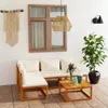 An outdoor patio setting with a wooden lounge set, coffee table, and plant. Produktbild-Vorschau