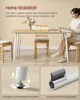 A woman is sitting at a dining table, reading a book. The image also shows close-ups of the table's features. Produktbild-Vorschau