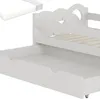 Close-up view of a white children's bed with a pull-out drawer and a mattress. Anteprima dell’immagine prodotto