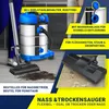A person is using a wet/dry vacuum cleaner to clean up dirt and liquid. Produktbild-Vorschau
