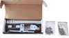 A white projector mount and hardware are laid out in a cardboard box. Produktbild-Vorschau