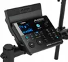 A close-up view of an electronic drum module attached to a stand. Produktbild-Vorschau