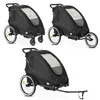 Three black DERYAN Luxe bicycle trailers are shown against a white background. Produktbild-Vorschau