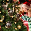 Children decorating a Christmas tree with ornaments. Produktbild-Vorschau