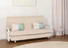A beige sofa with two decorative pillows is shown in a room with a white wall and light curtains. Produktbild-Vorschau