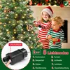 Two children in pajamas decorating a Christmas tree with lights and ornaments. Produktbild-Vorschau