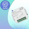 A close-up marketing image of a white Zigbee garage door module with green screw terminals, set against a gradient background of light blue and light green. A blue circular badge with a white checkmark is overlaid on the top left. Voir les images du produit
