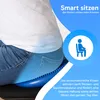 A person sitting on a blue balance cushion on a chair, with marketing text and an icon. Voir les images du produit
