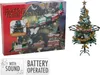 A product box and a decorated Christmas tree with a train on it. Podgląd zdjęcia produktu