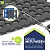 A close-up view of interlocking black pool mats with circular cutouts, with a pair of scissors positioned to cut one of the mats. In the upper left corner, a circular graphic displays two smaller mats, one blue and one gray, with text indicating availabili Náhľad obrázku produktu