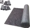 A roll of grey protective fleece material is shown, with smaller rolls and flat pieces of the same material arranged in the background. Produktbild-Vorschau
