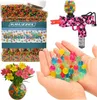 A collage of images showing gel balls, a gel ball gun, and flowers in a vase with gel balls. Náhled obrázku produktu