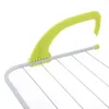 A close-up of a green handle attached to a white and gray drying rack. Produktbild-Vorschau